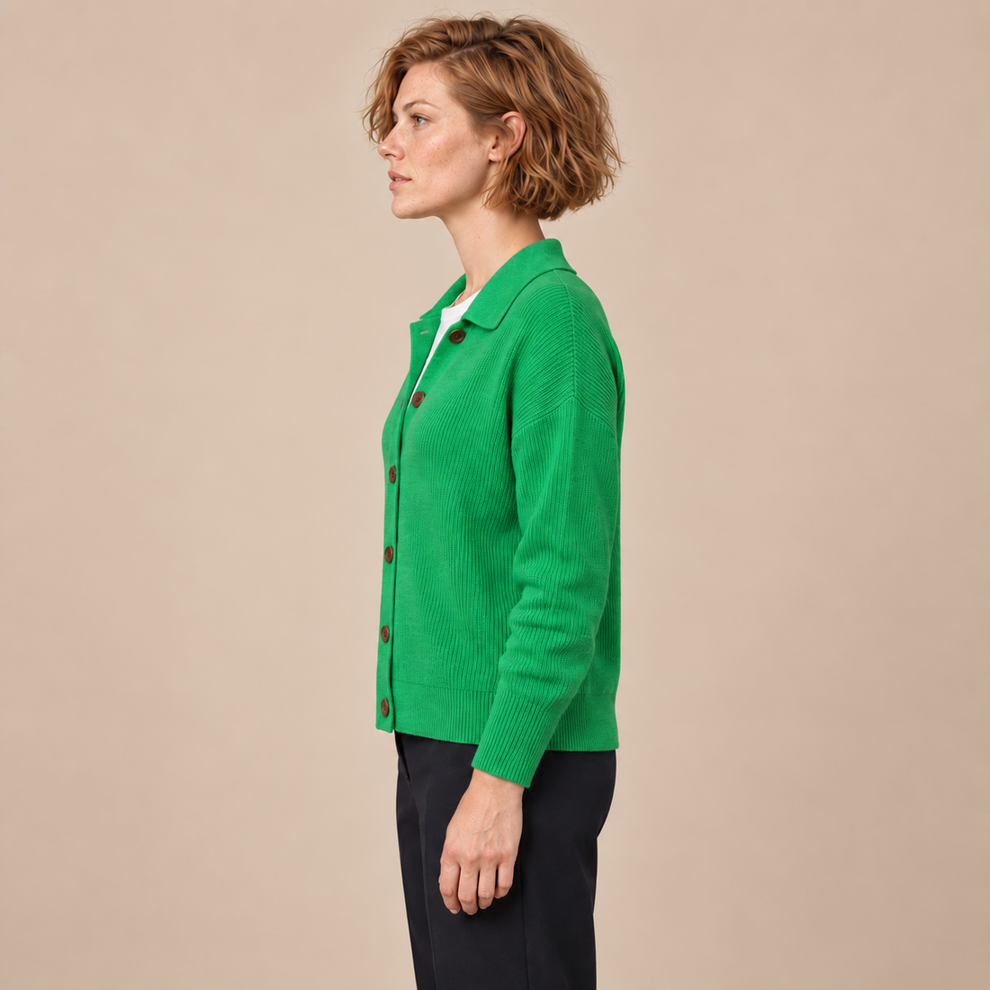 Damesvest met knoopsluiting en kraag
