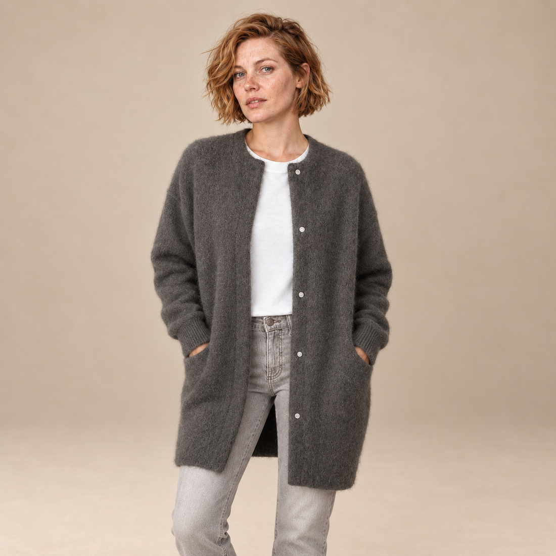 Damesvest met knoopsluiting en geribde boorden