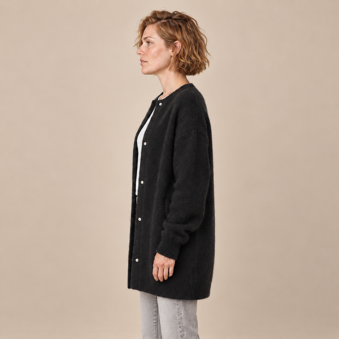 Damesvest met knoopsluiting en geribde boorden