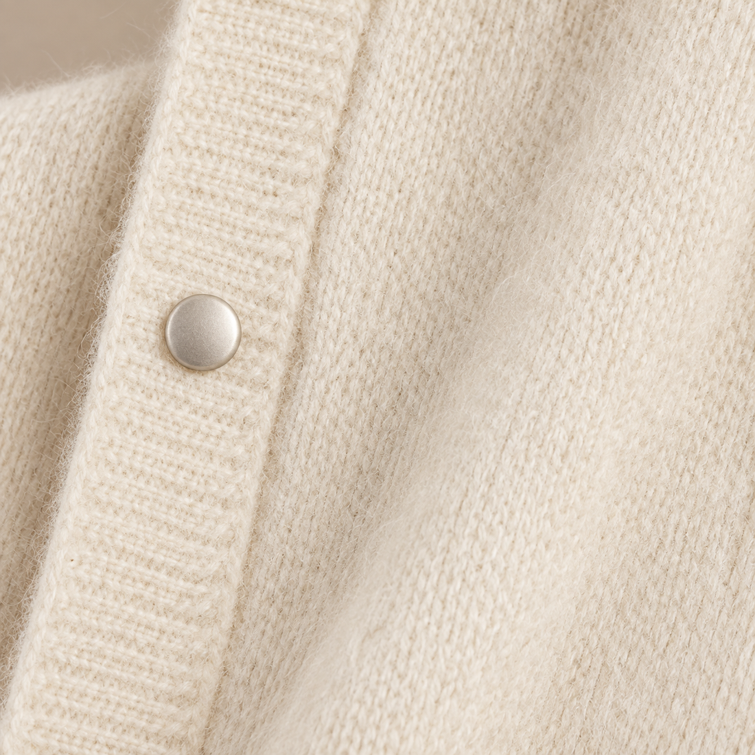 Damesvest met knoopsluiting en geribde boorden