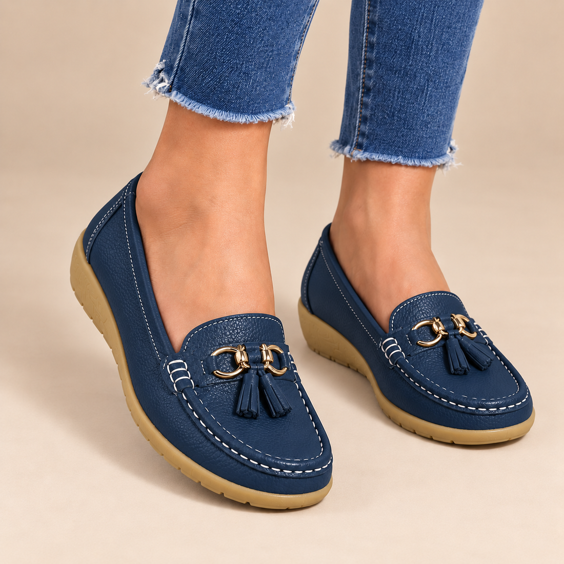 Leren damesloafers met sleehakzool en kwastjes