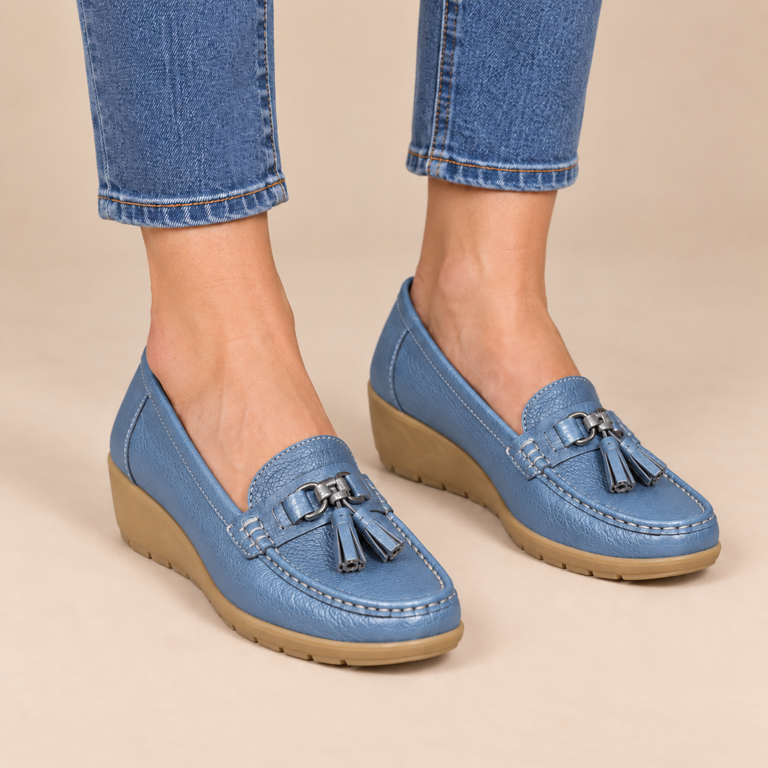 Leren damesloafers met sleehakzool en kwastjes