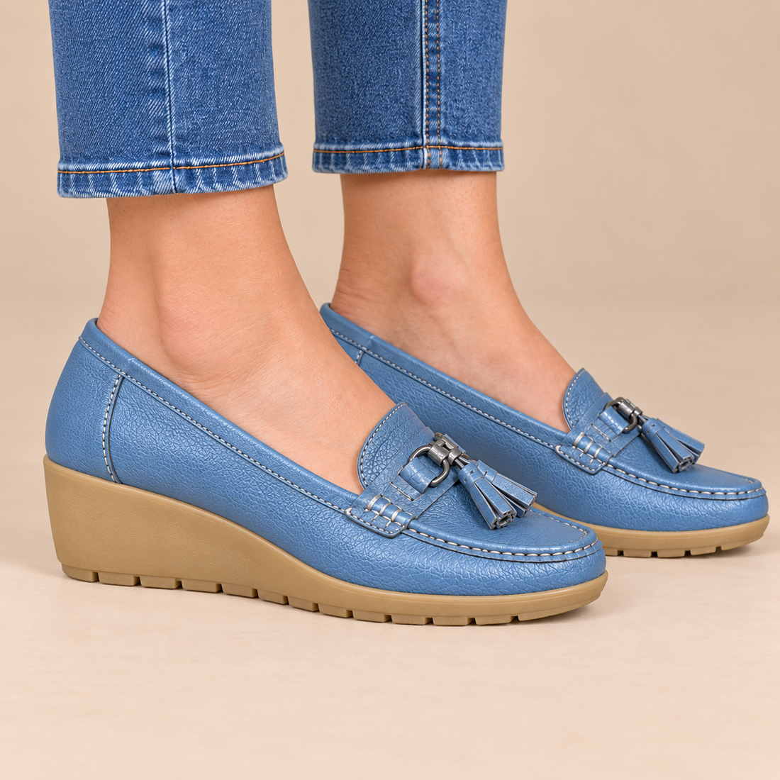 Leren damesloafers met sleehakzool en kwastjes