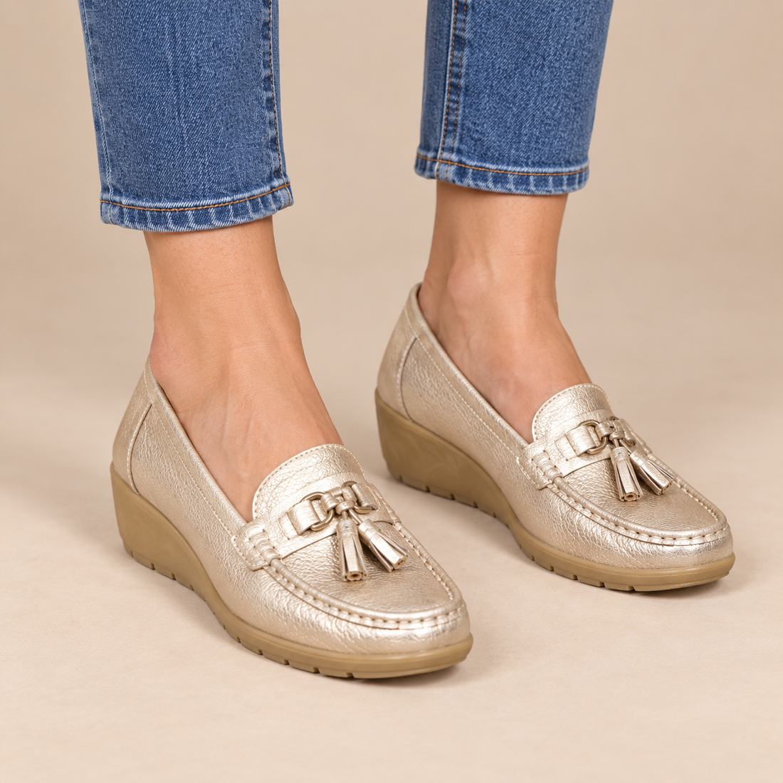 Leren damesloafers met sleehakzool en kwastjes