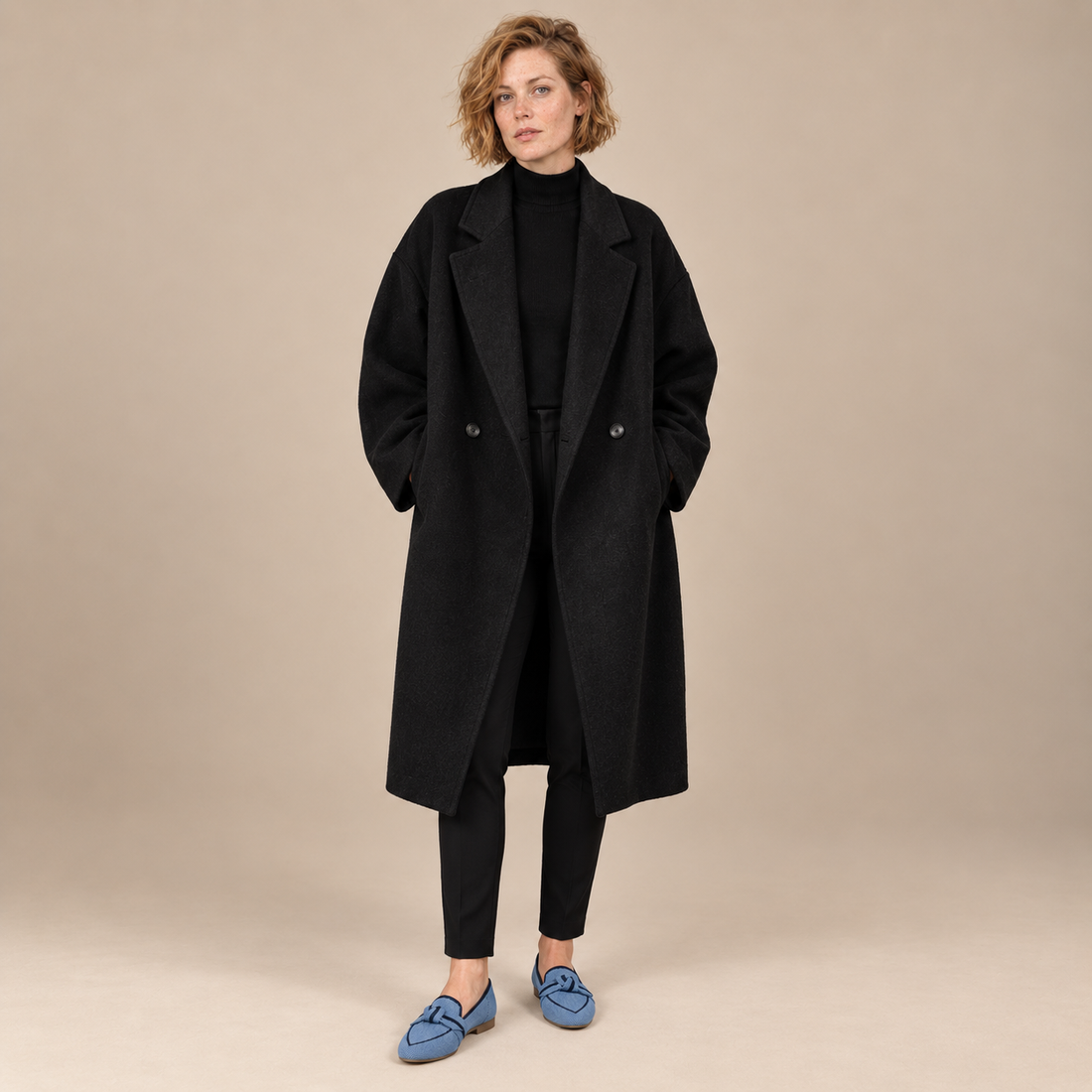 Oversized lange damesjas met klassieke revers