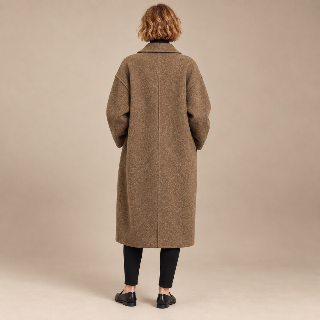 Oversized lange damesjas met klassieke revers