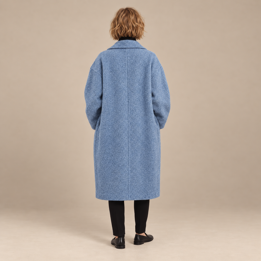 Oversized lange damesjas met klassieke revers