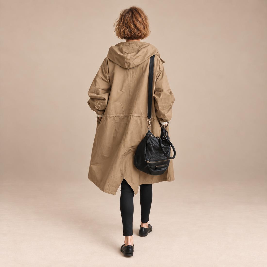 Lange damestrenchcoat met capuchon en knoopsluiting