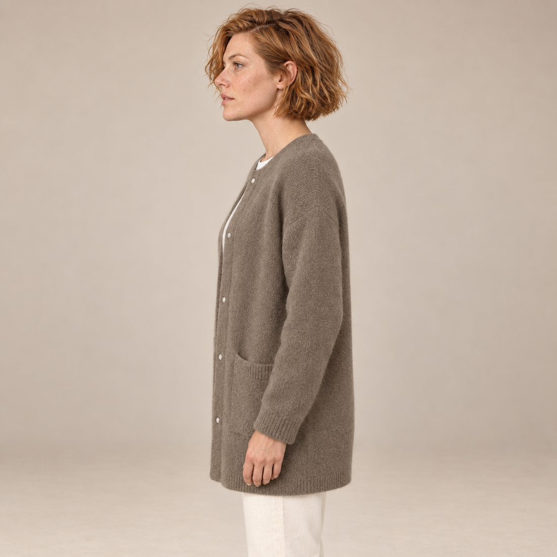 Damesvest met knoopsluiting, geribde boorden en zakken