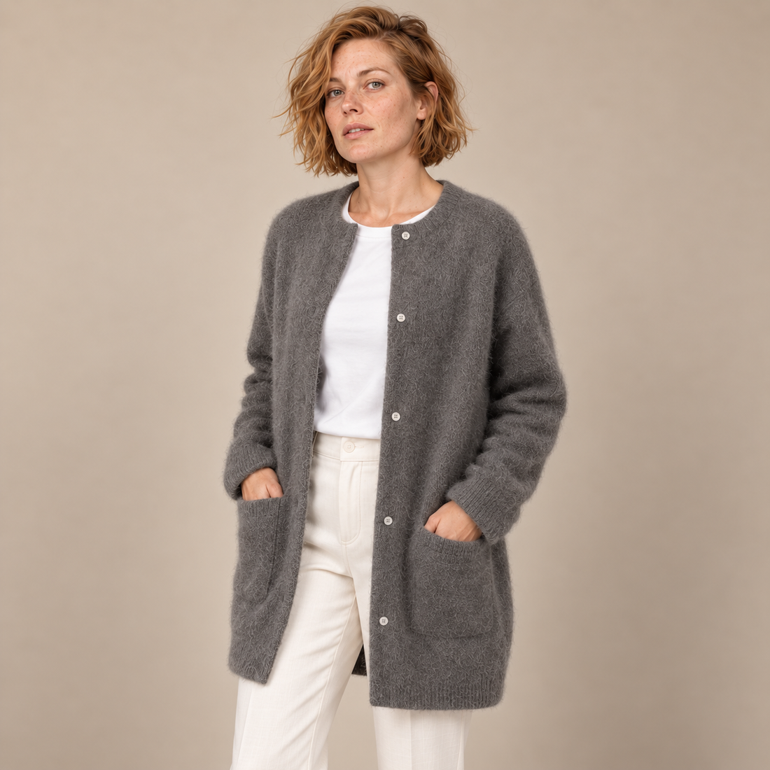 Damesvest met knoopsluiting, geribde boorden en zakken