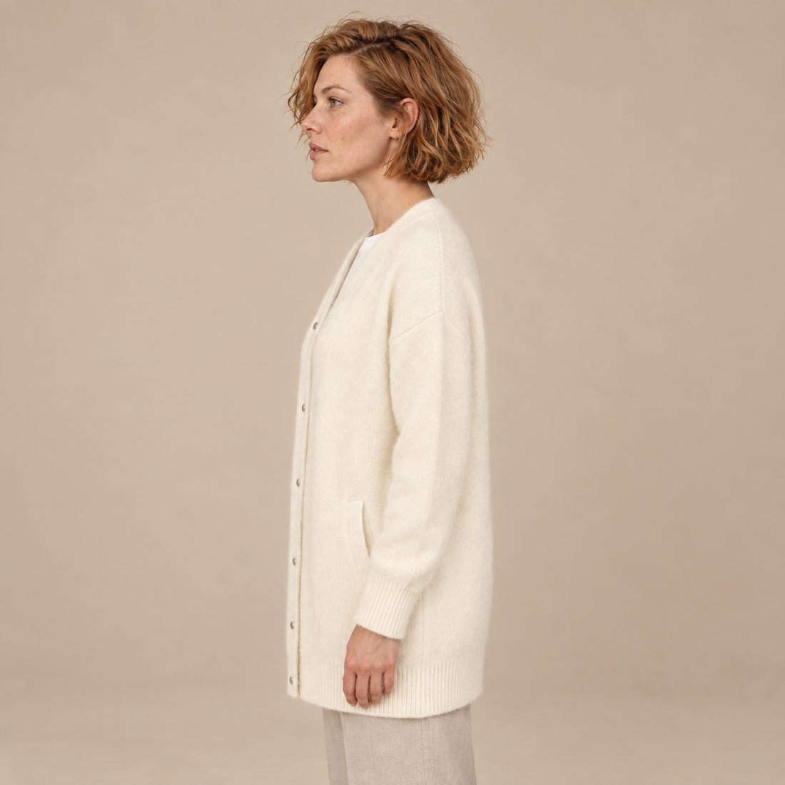 Damesvest met knoopsluiting, geribde boorden en zakken