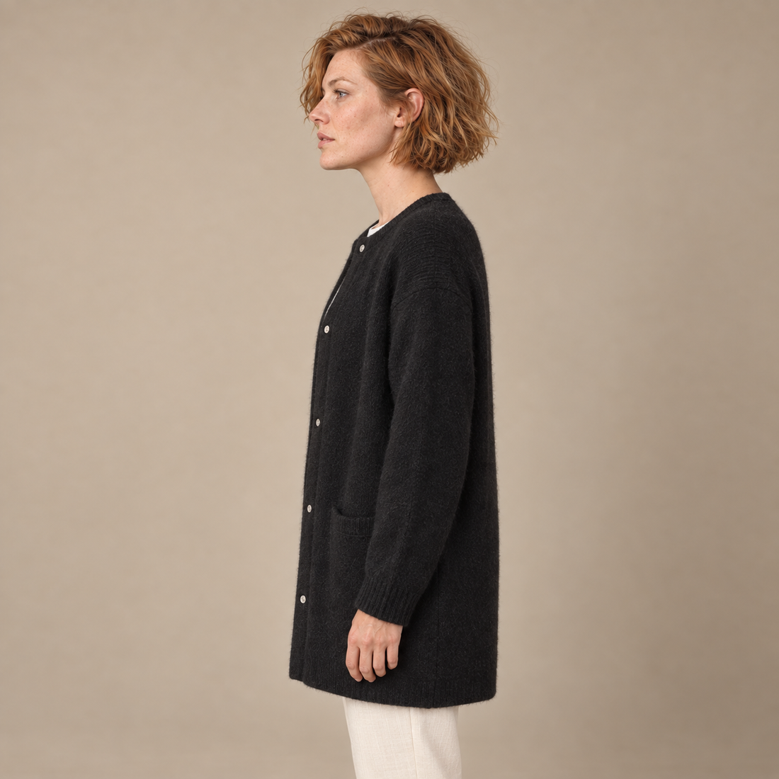 Damesvest met knoopsluiting, geribde boorden en zakken