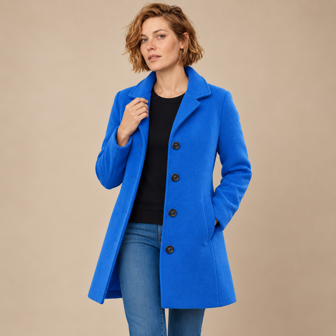 Lange winterjas voor dames met knoopsluiting en reverskraag