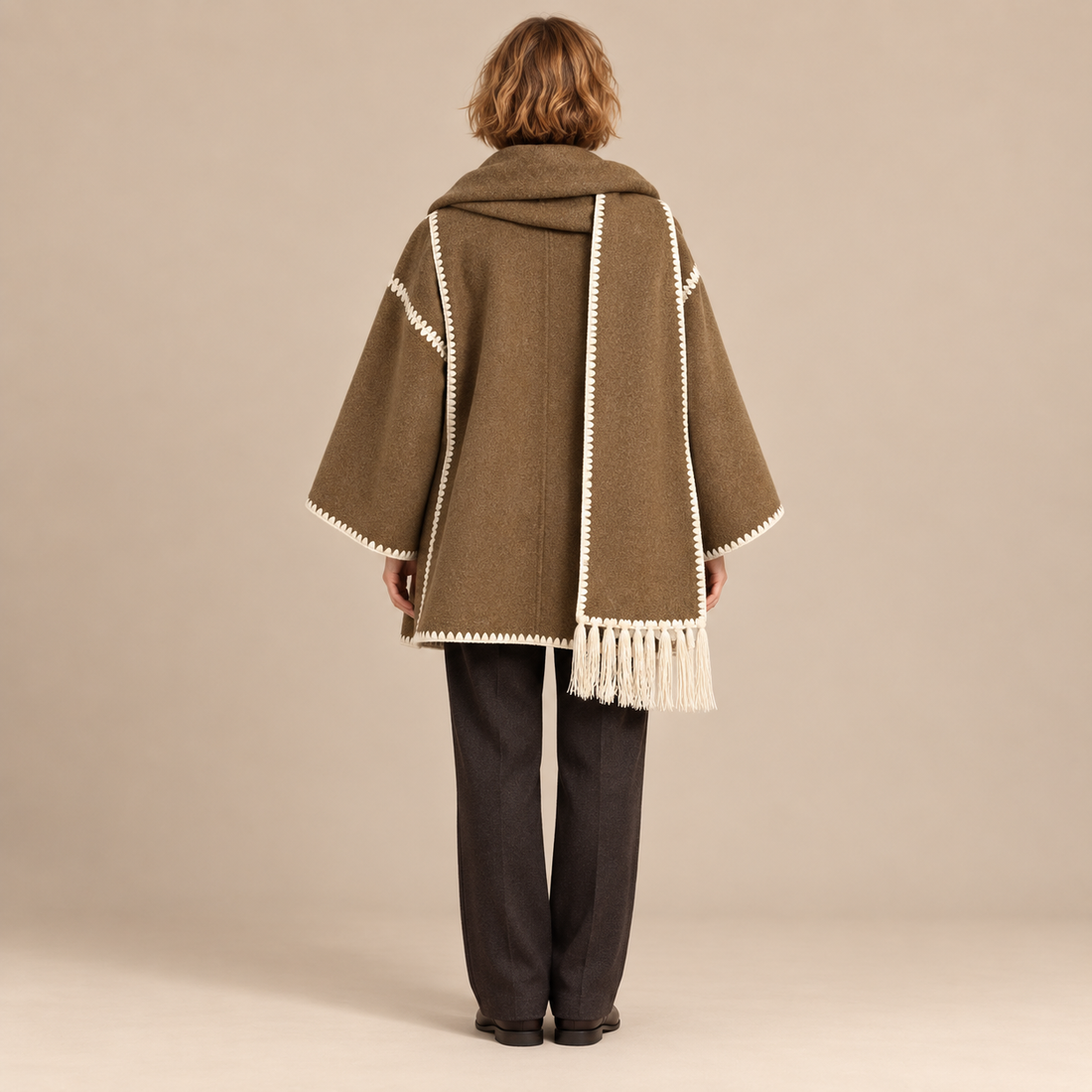Capejas voor dames met contrastrand en franjes