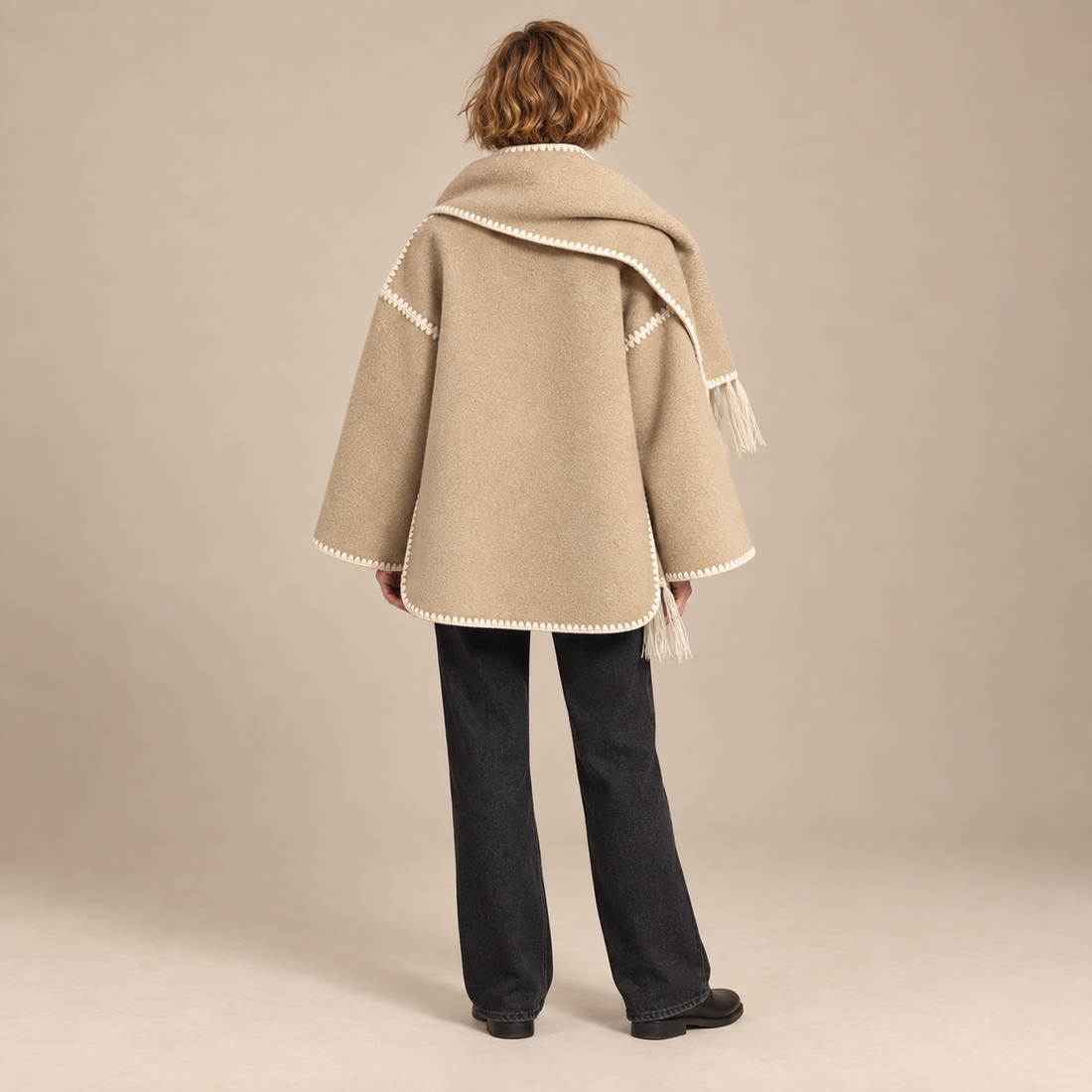 Capejas voor dames met contrastrand en franjes