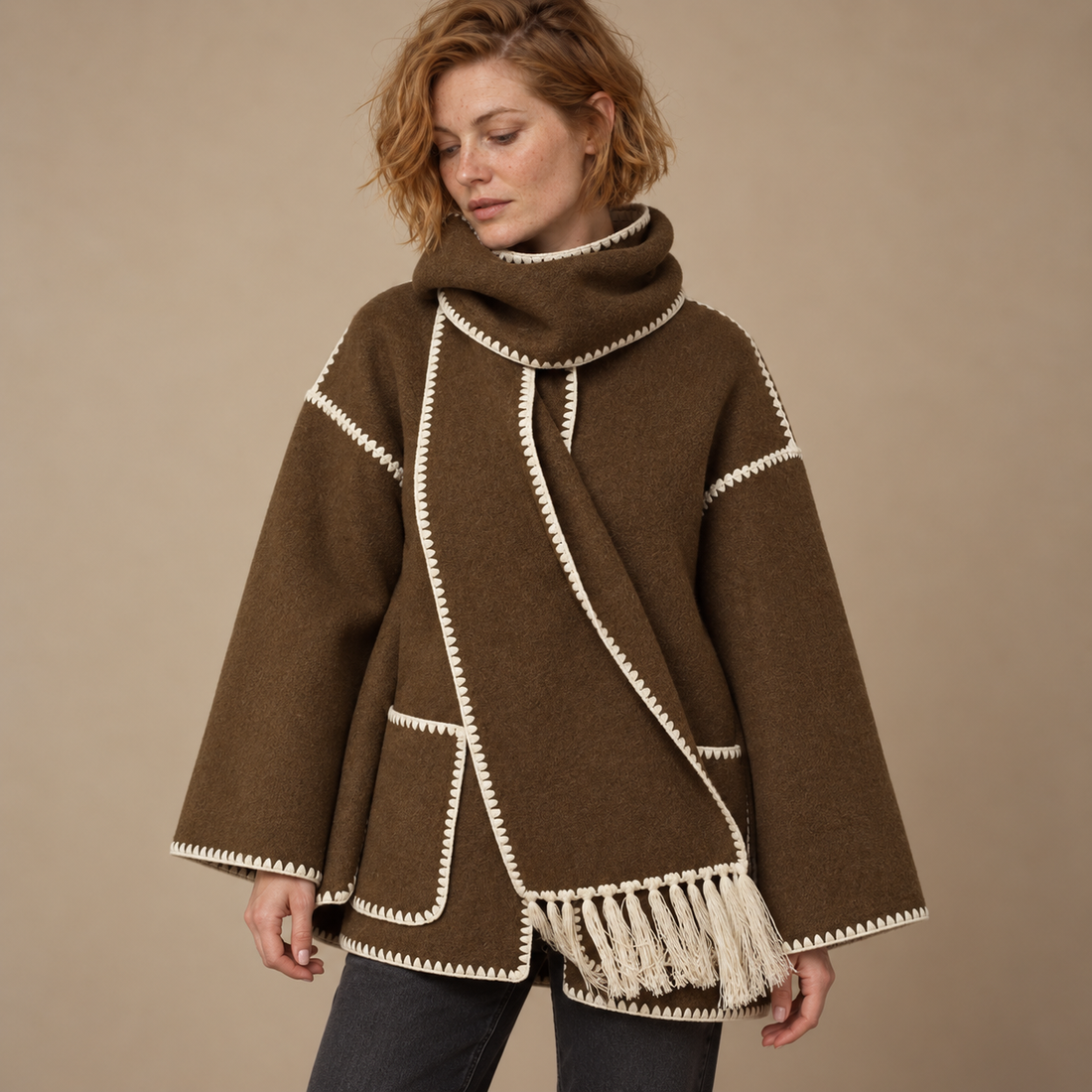 Capejas voor dames met contrastrand en franjes
