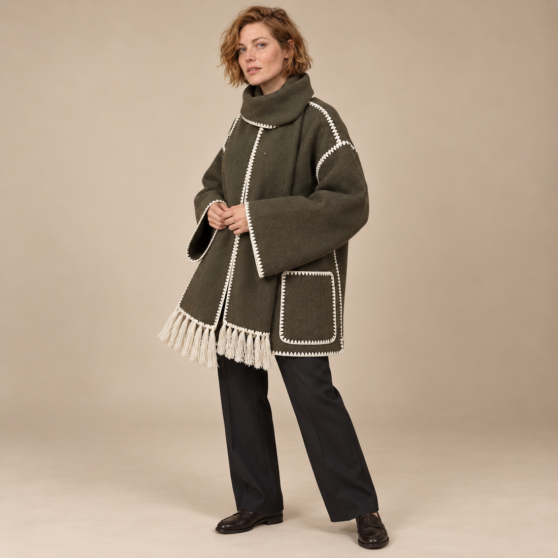 Capejas voor dames met contrastrand en franjes