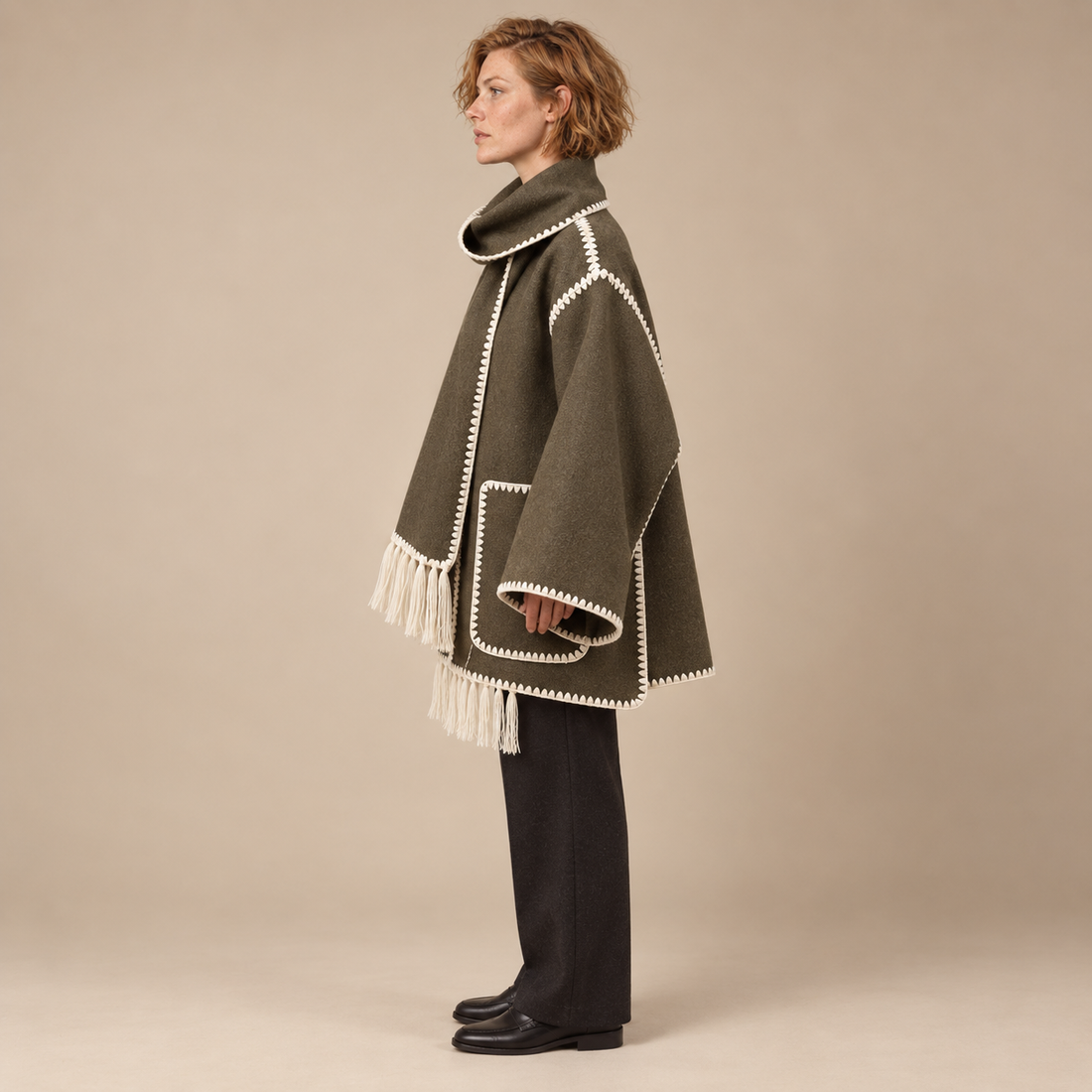 Capejas voor dames met contrastrand en franjes