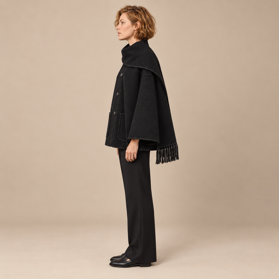Capejas voor dames met contrastrand en franjes