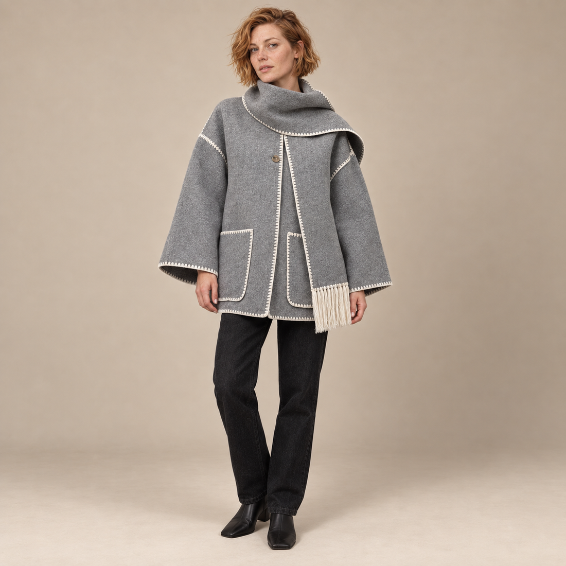 Capejas voor dames met contrastrand en franjes