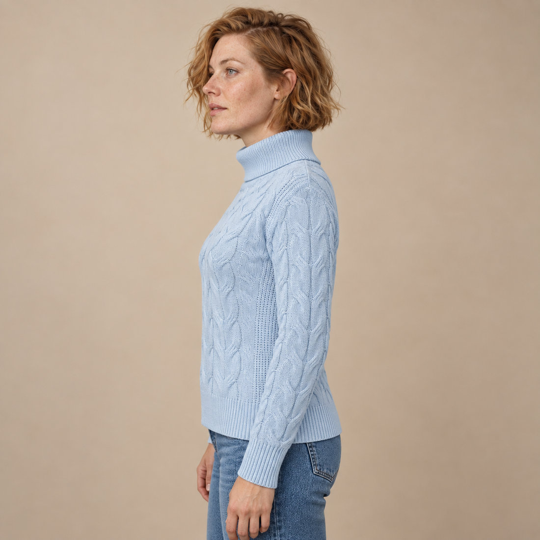 Knusse kabelgebreide coltrui voor dames