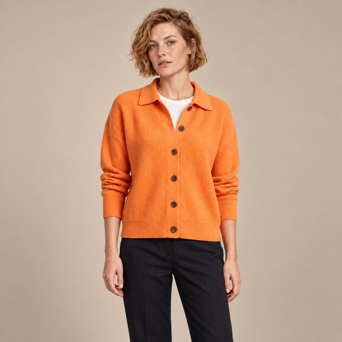Damesvest met knoopsluiting en kraag