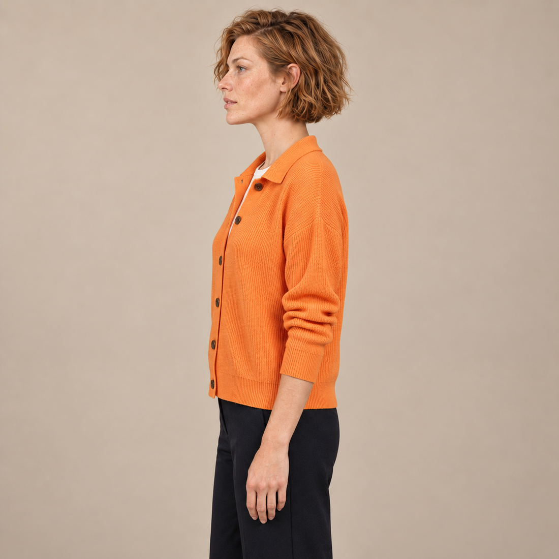 Damesvest met knoopsluiting en kraag