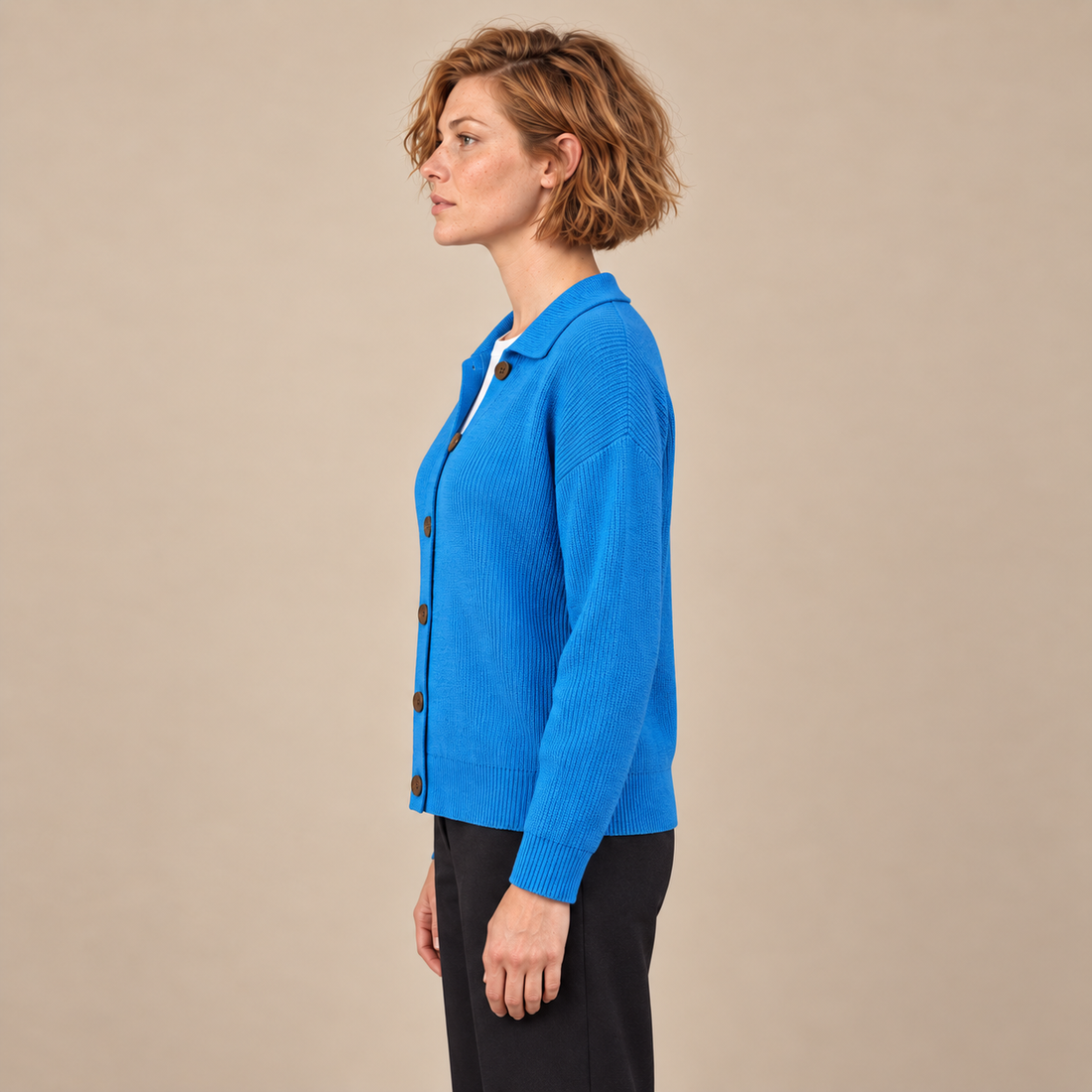 Damesvest met knoopsluiting en kraag