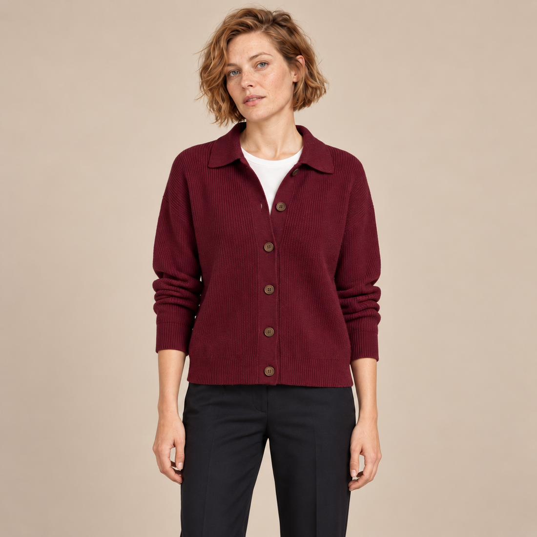Damesvest met knoopsluiting en kraag