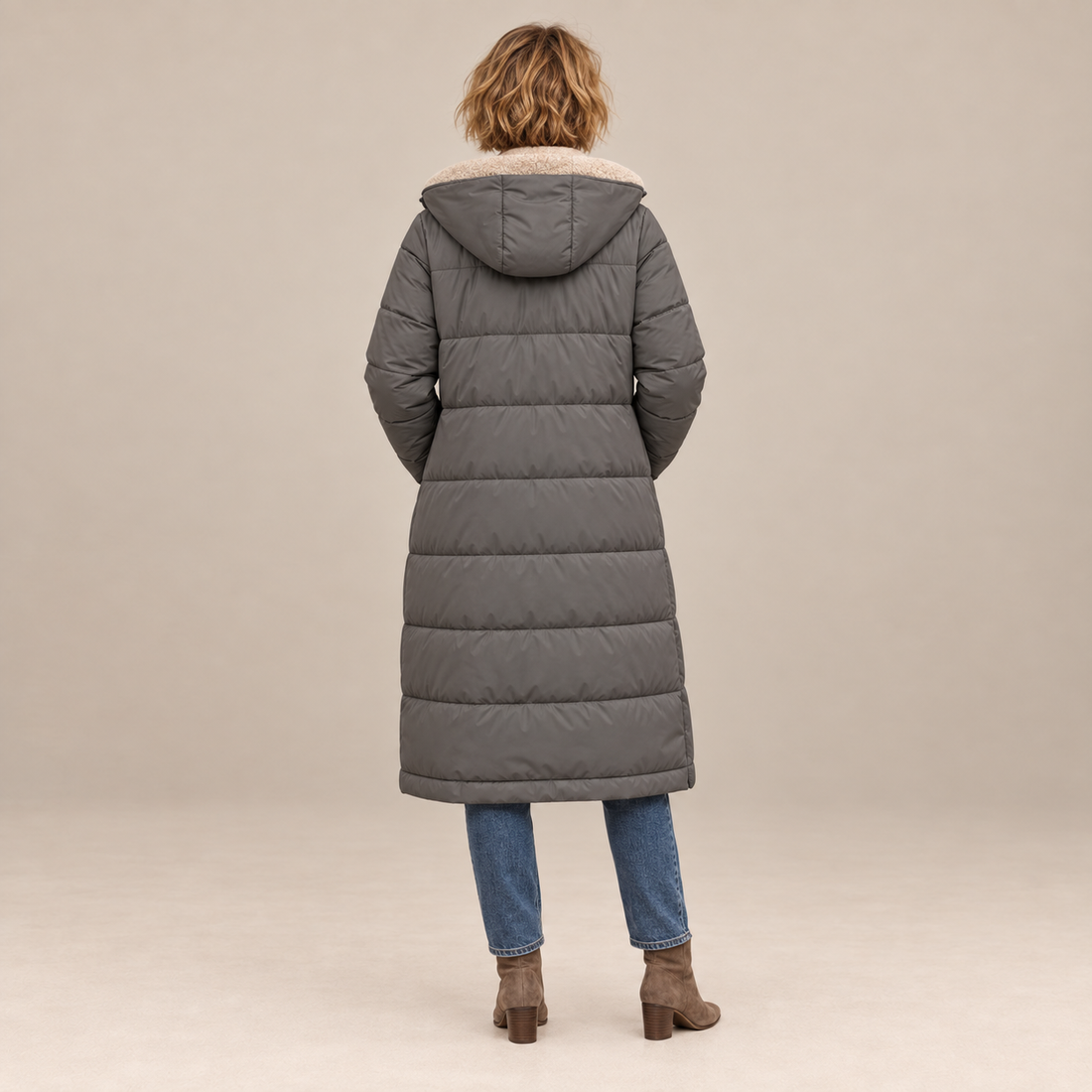 Lange damesjas met capuchon en rits