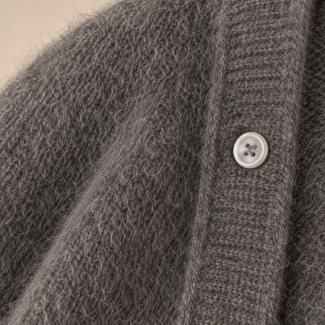 Damesvest met knoopsluiting en geribde boorden