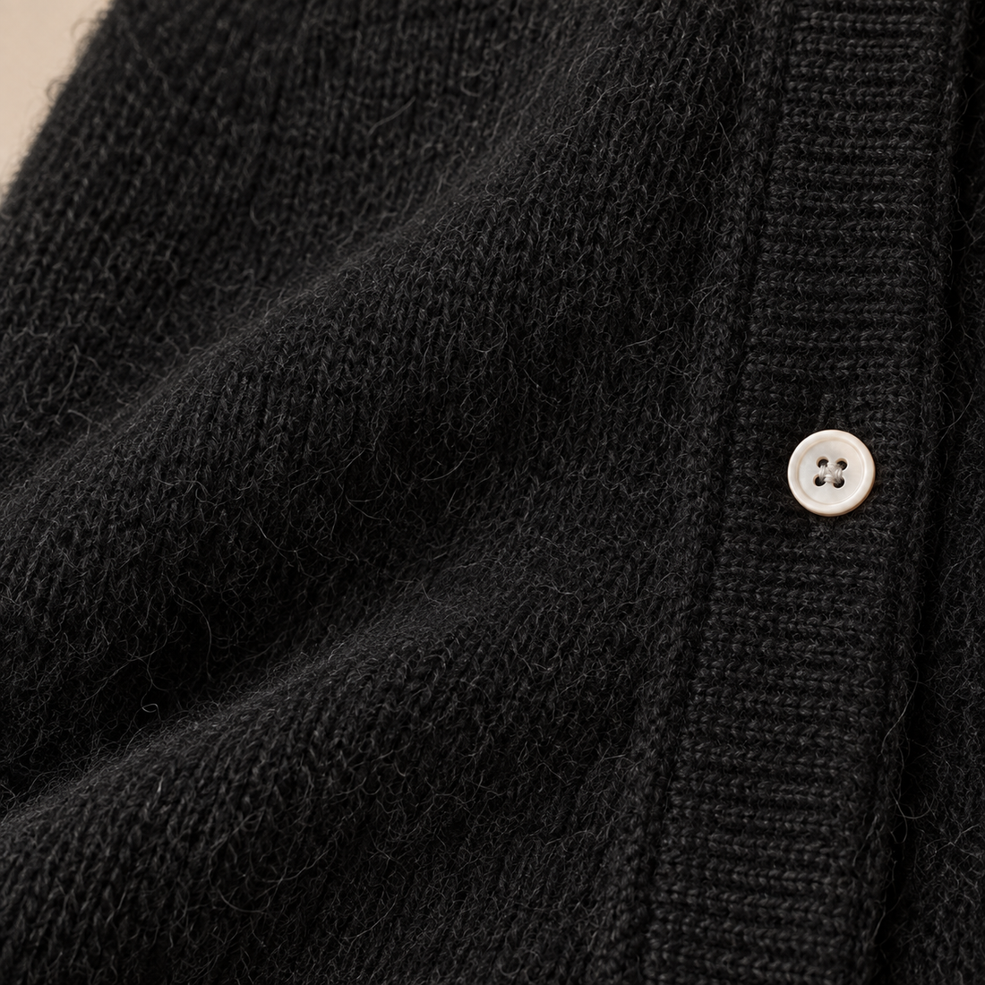 Damesvest met knoopsluiting en geribde boorden