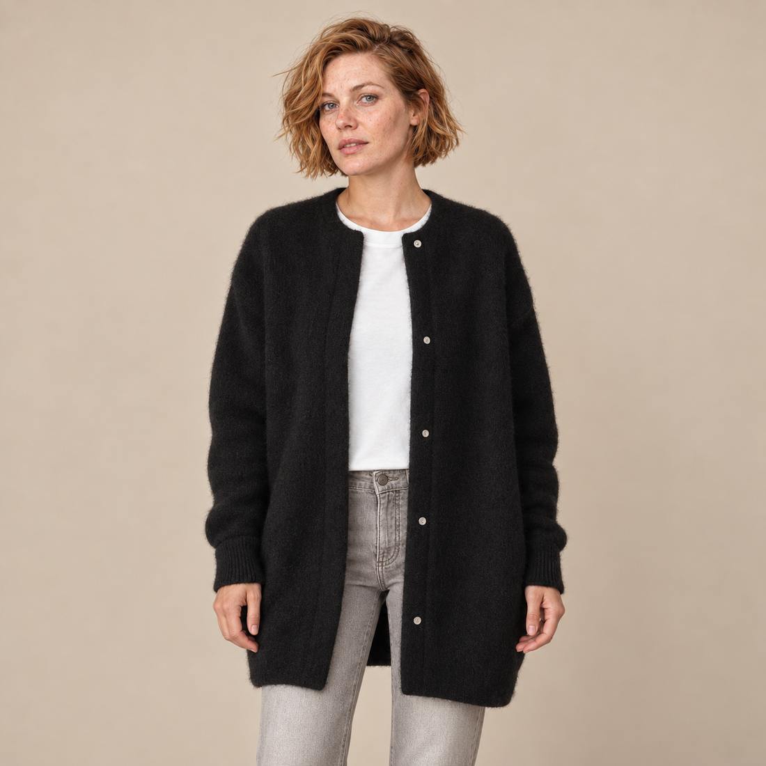 Damesvest met knoopsluiting en geribde boorden