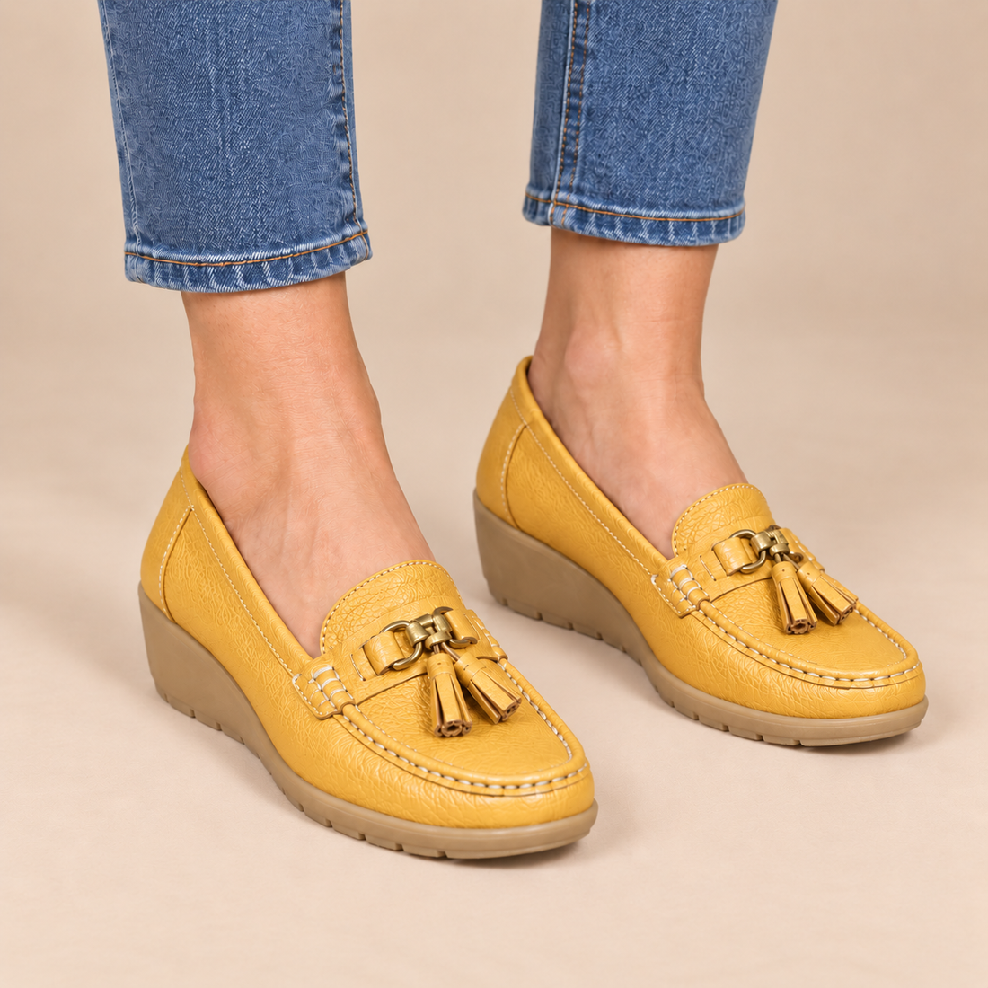 Leren damesloafers met sleehakzool en kwastjes