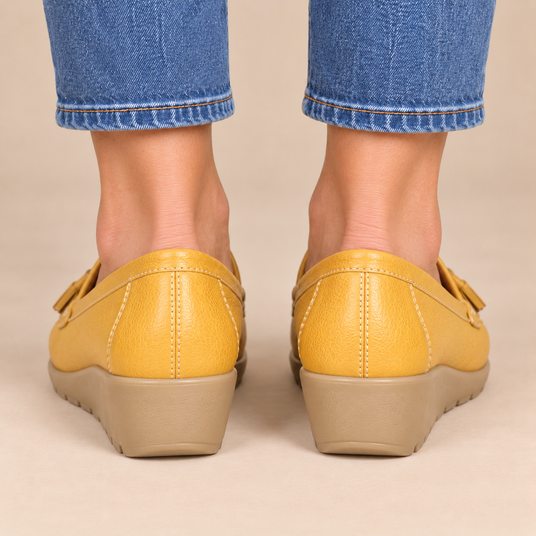 Leren damesloafers met sleehakzool en kwastjes