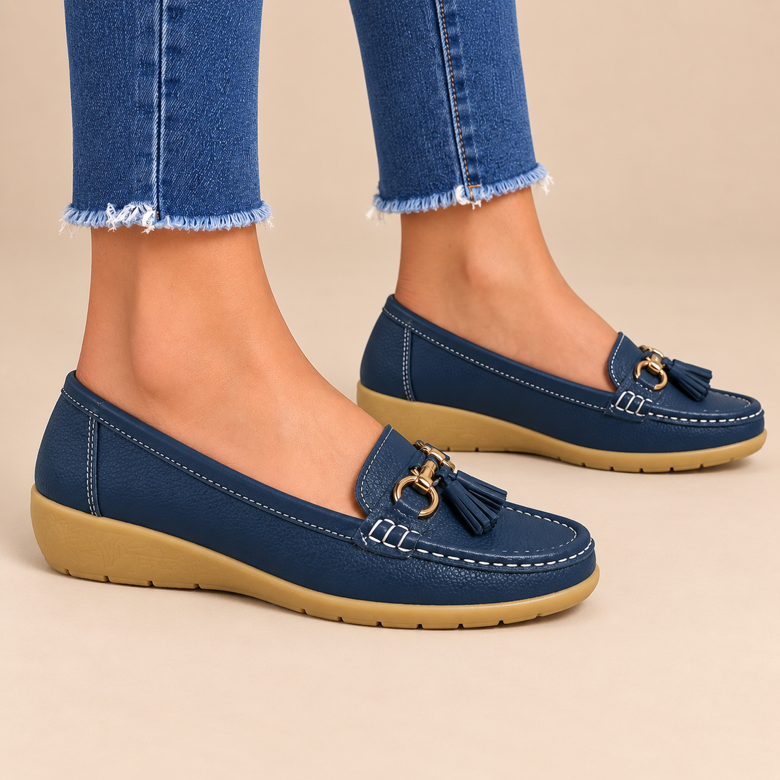 Leren damesloafers met sleehakzool en kwastjes