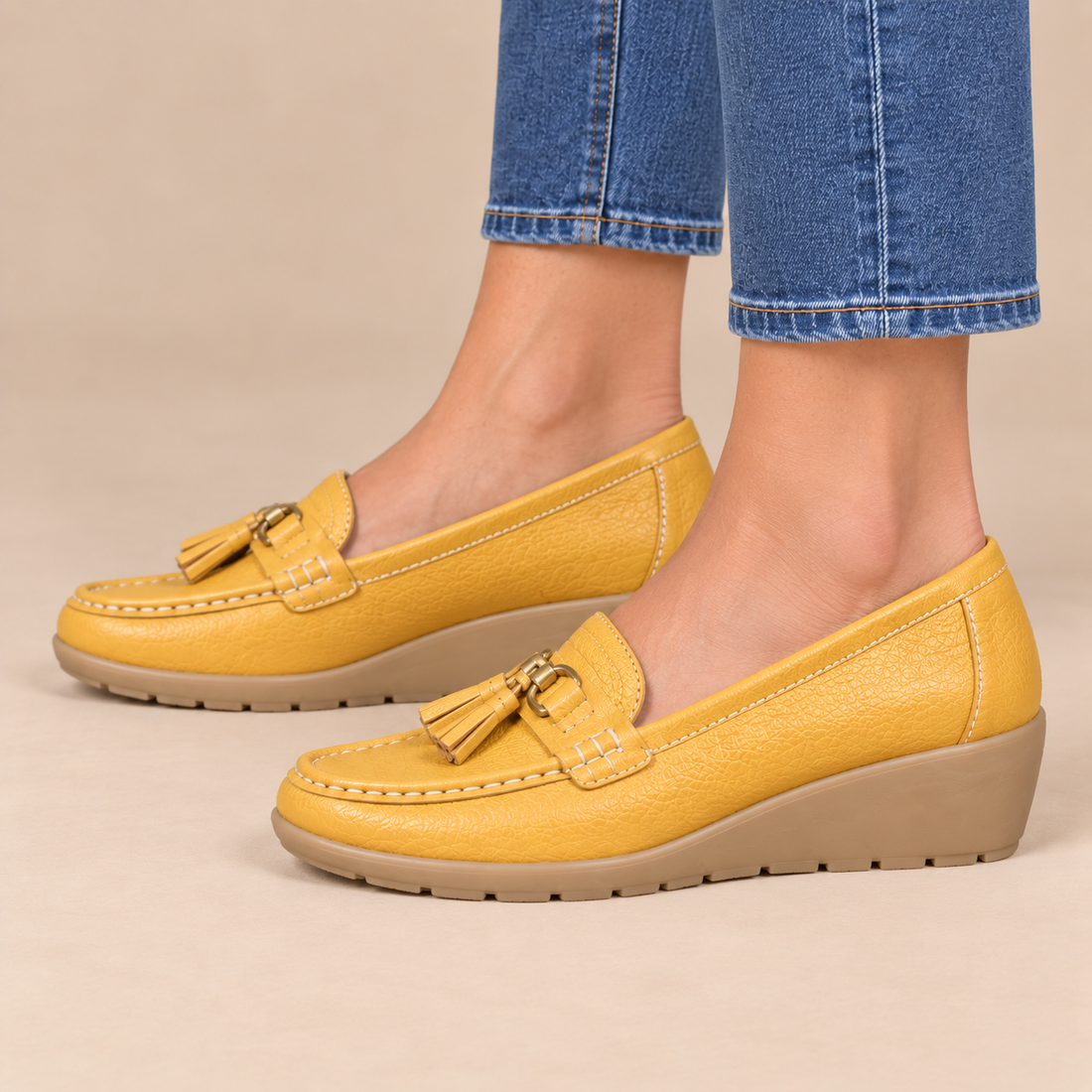 Leren damesloafers met sleehakzool en kwastjes