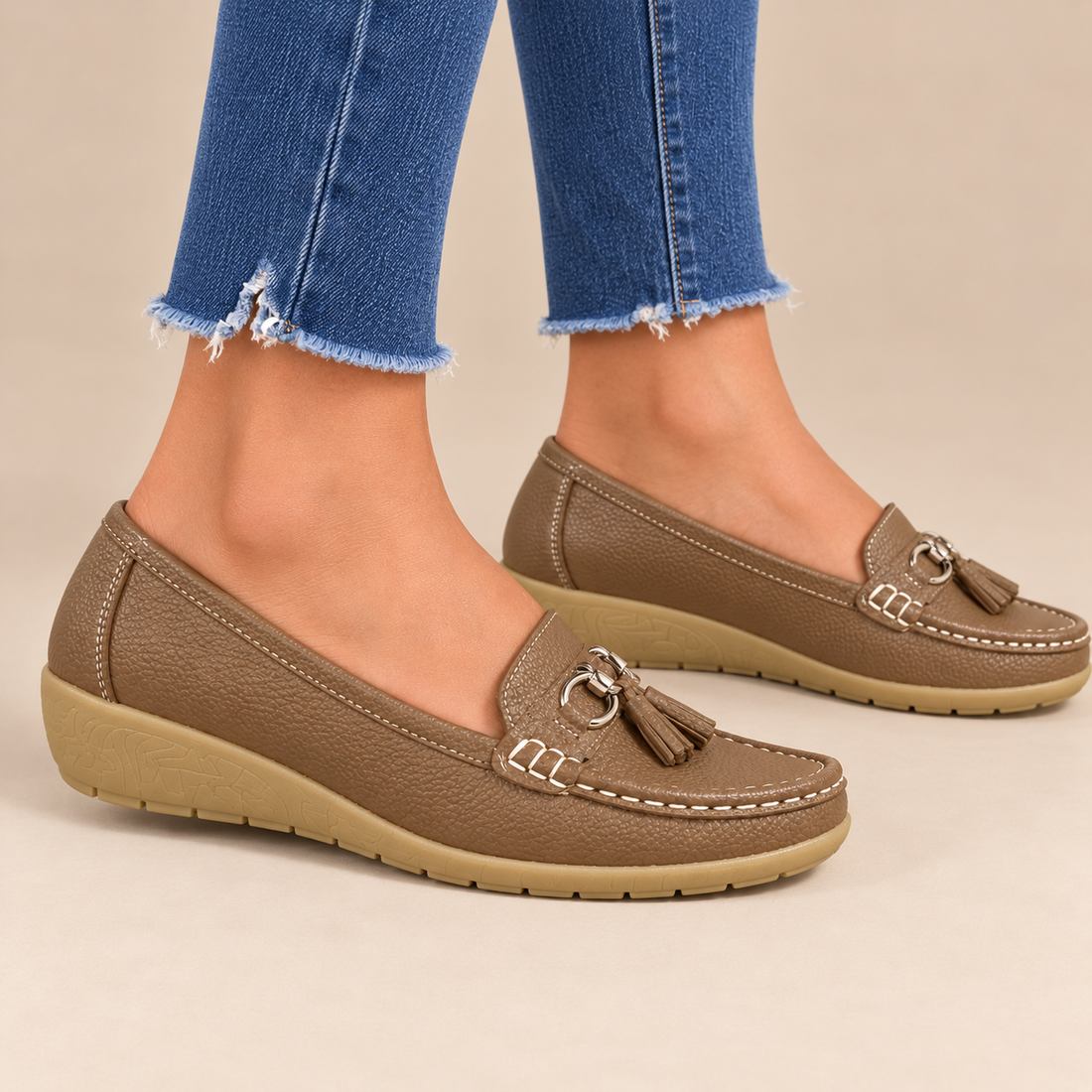 Leren damesloafers met sleehakzool en kwastjes