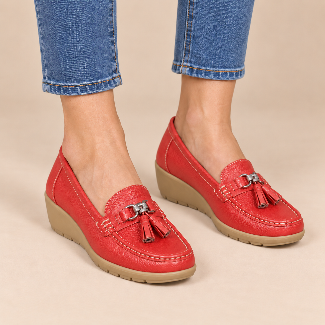 Leren damesloafers met sleehakzool en kwastjes