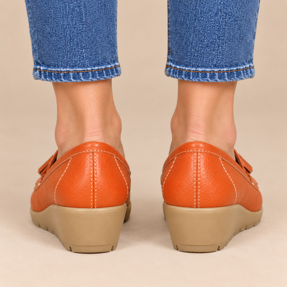 Leren damesloafers met sleehakzool en kwastjes