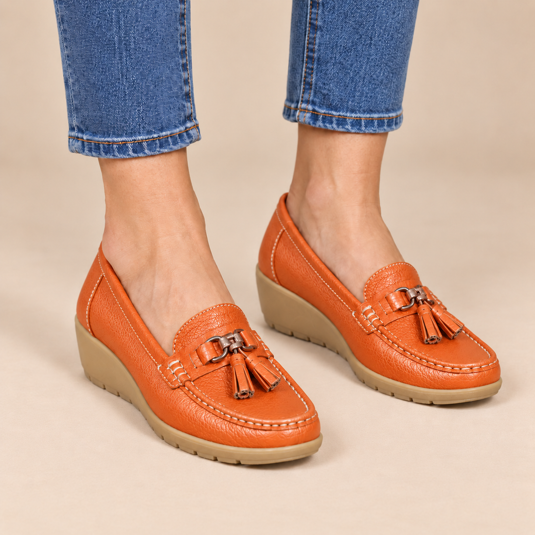Leren damesloafers met sleehakzool en kwastjes