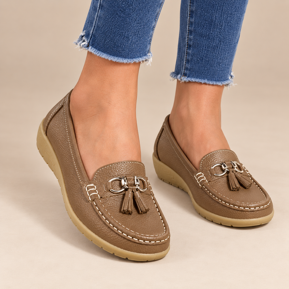 Leren damesloafers met sleehakzool en kwastjes