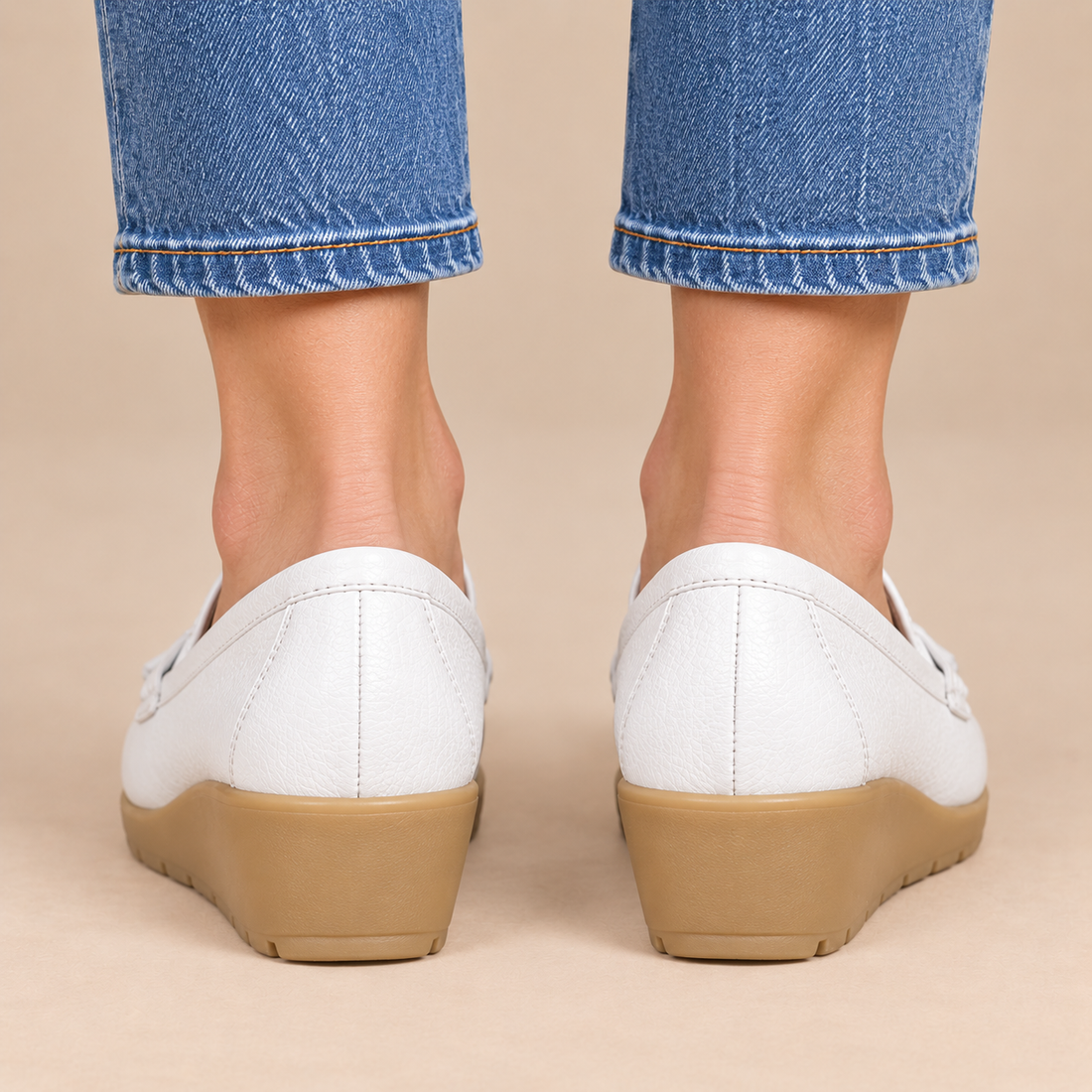 Leren damesloafers met sleehakzool en kwastjes