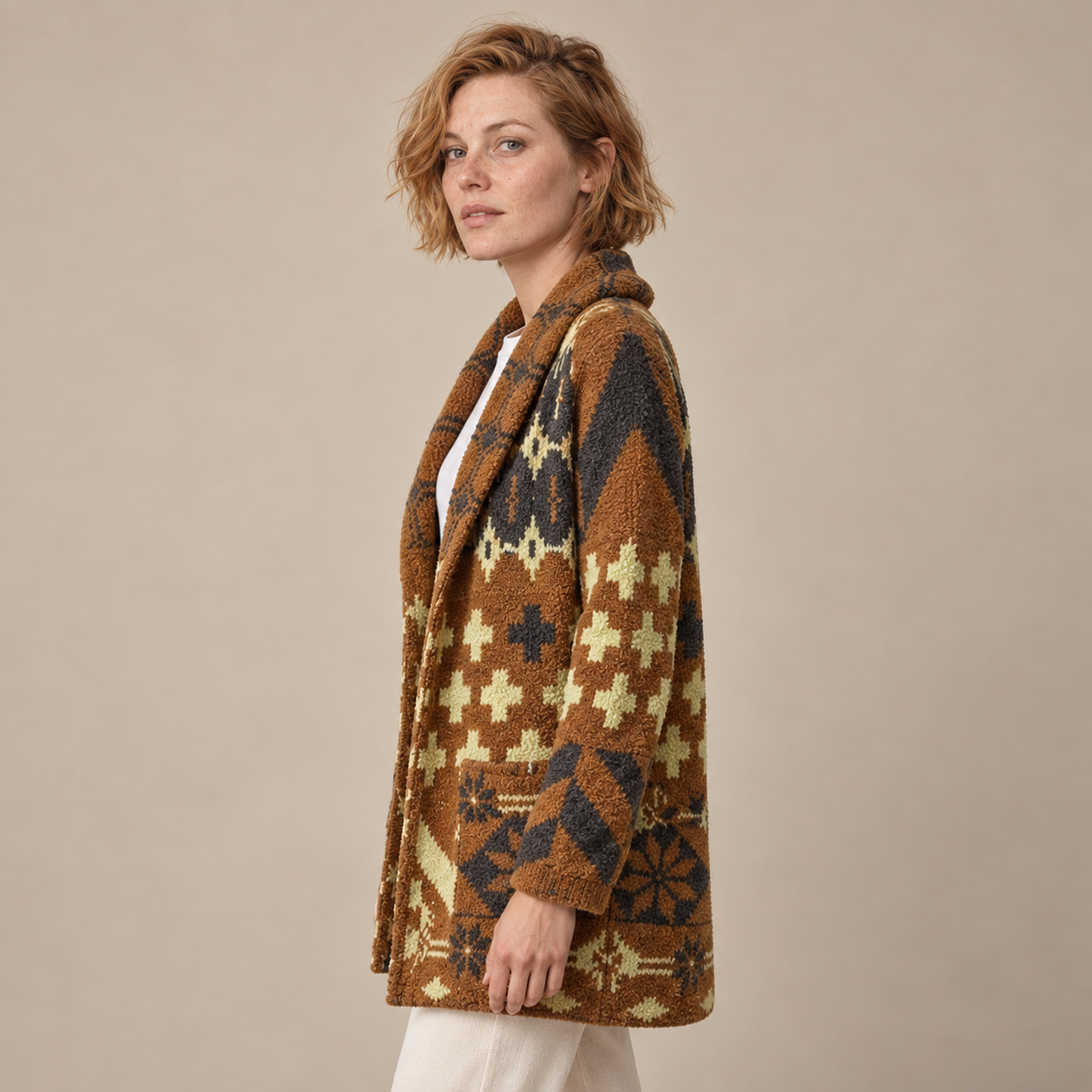 Damesvest met knoopsluiting en gebreid patroon