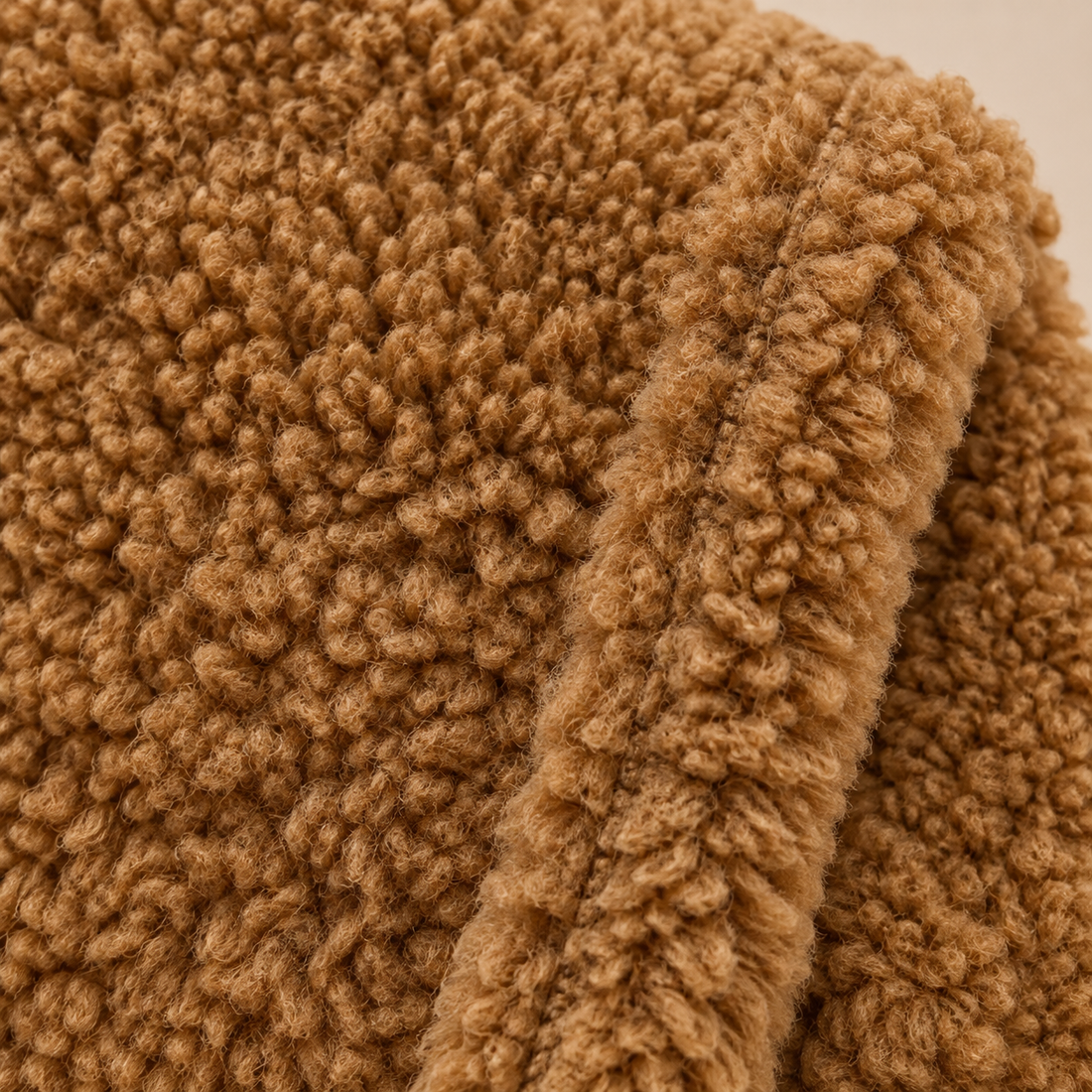 Lange teddyjas voor dames met reverskraag