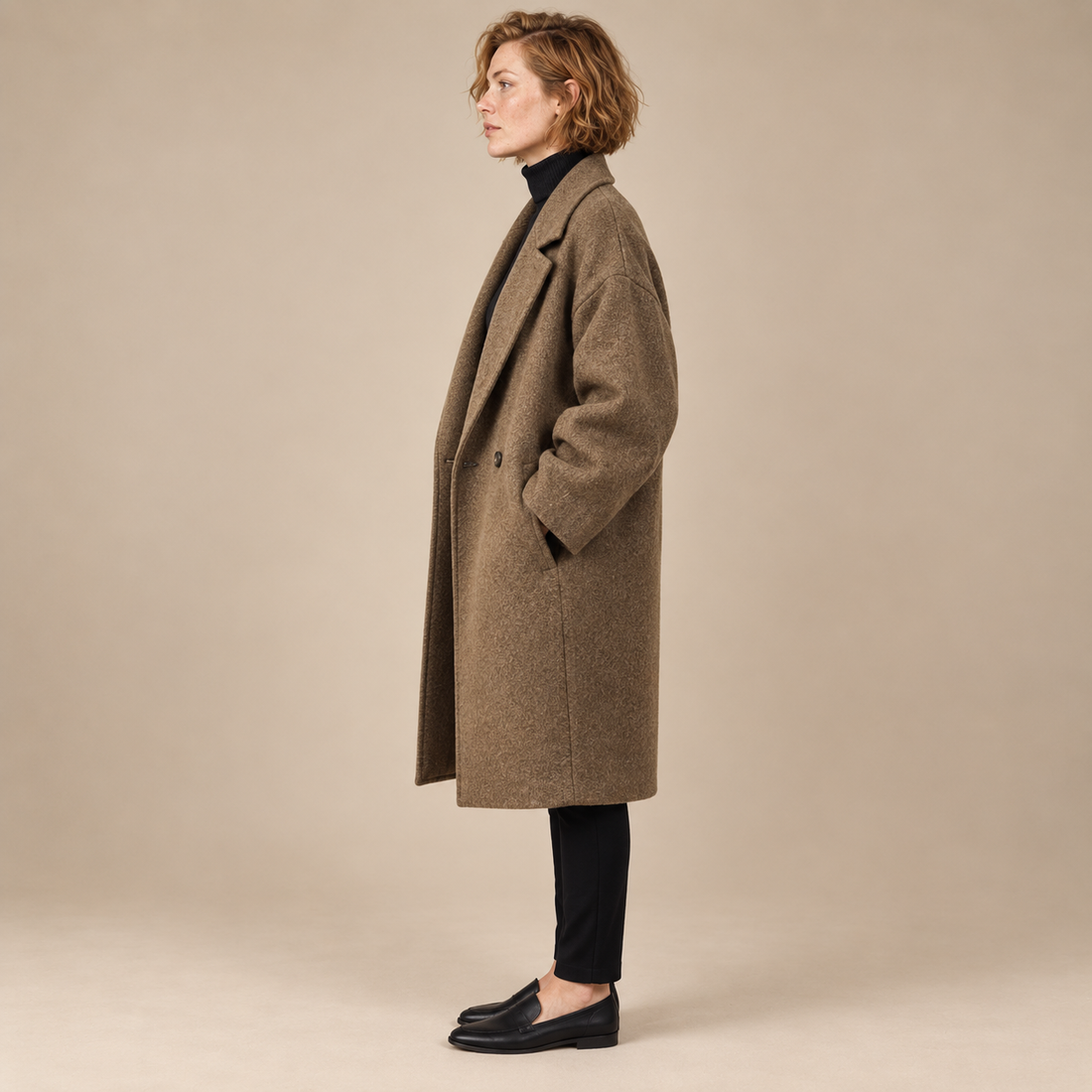 Oversized lange damesjas met klassieke revers