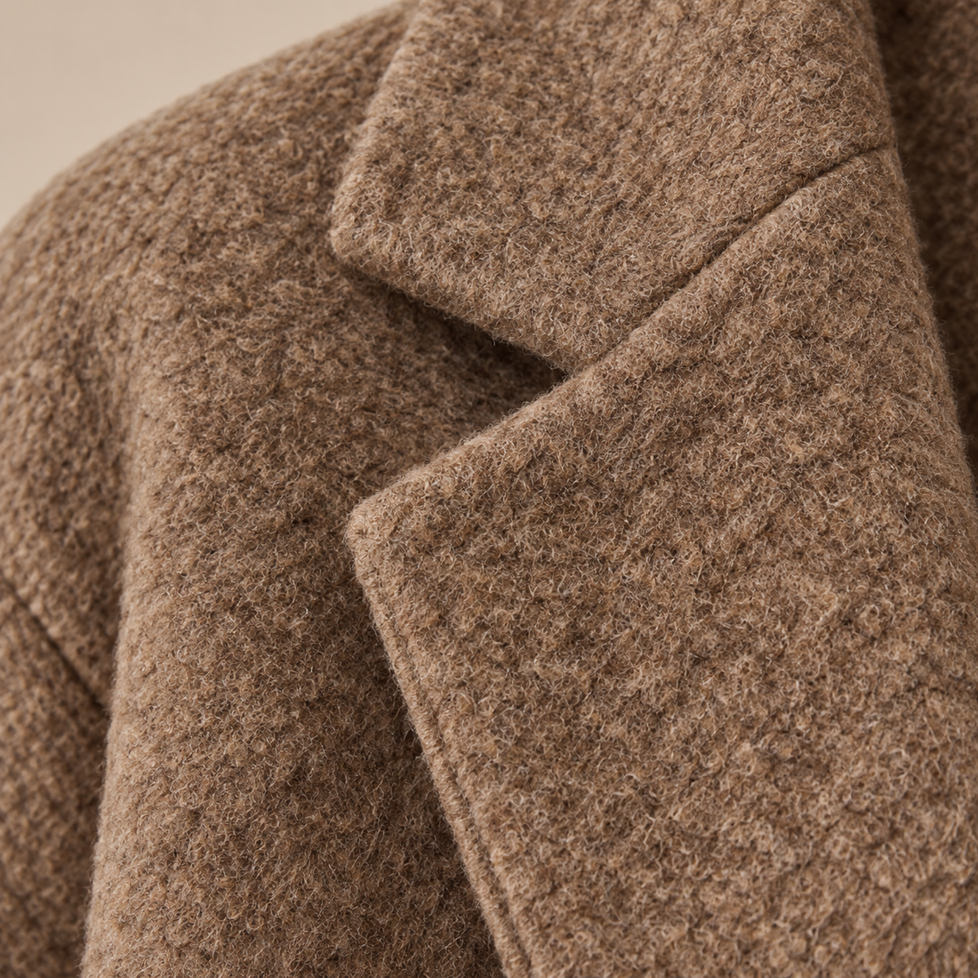 Oversized lange damesjas met klassieke revers
