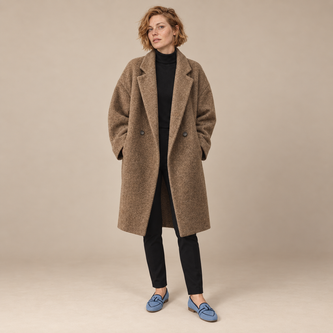 Oversized lange damesjas met klassieke revers