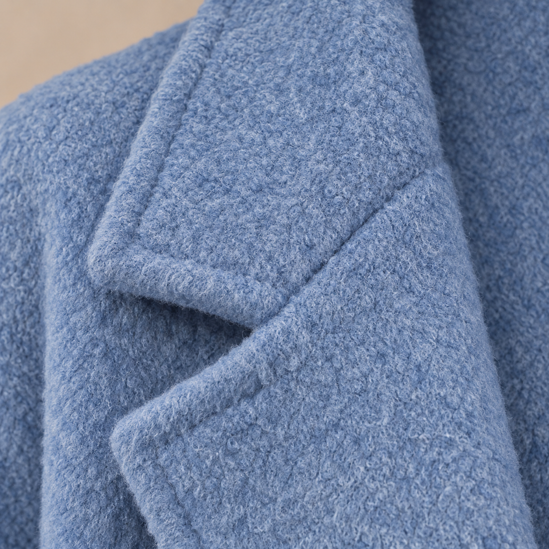 Oversized lange damesjas met klassieke revers