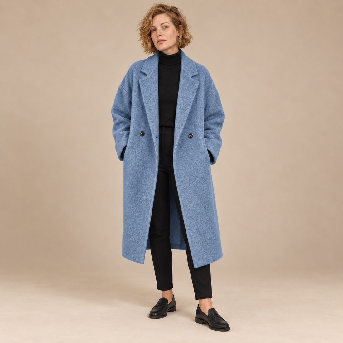 Oversized lange damesjas met klassieke revers